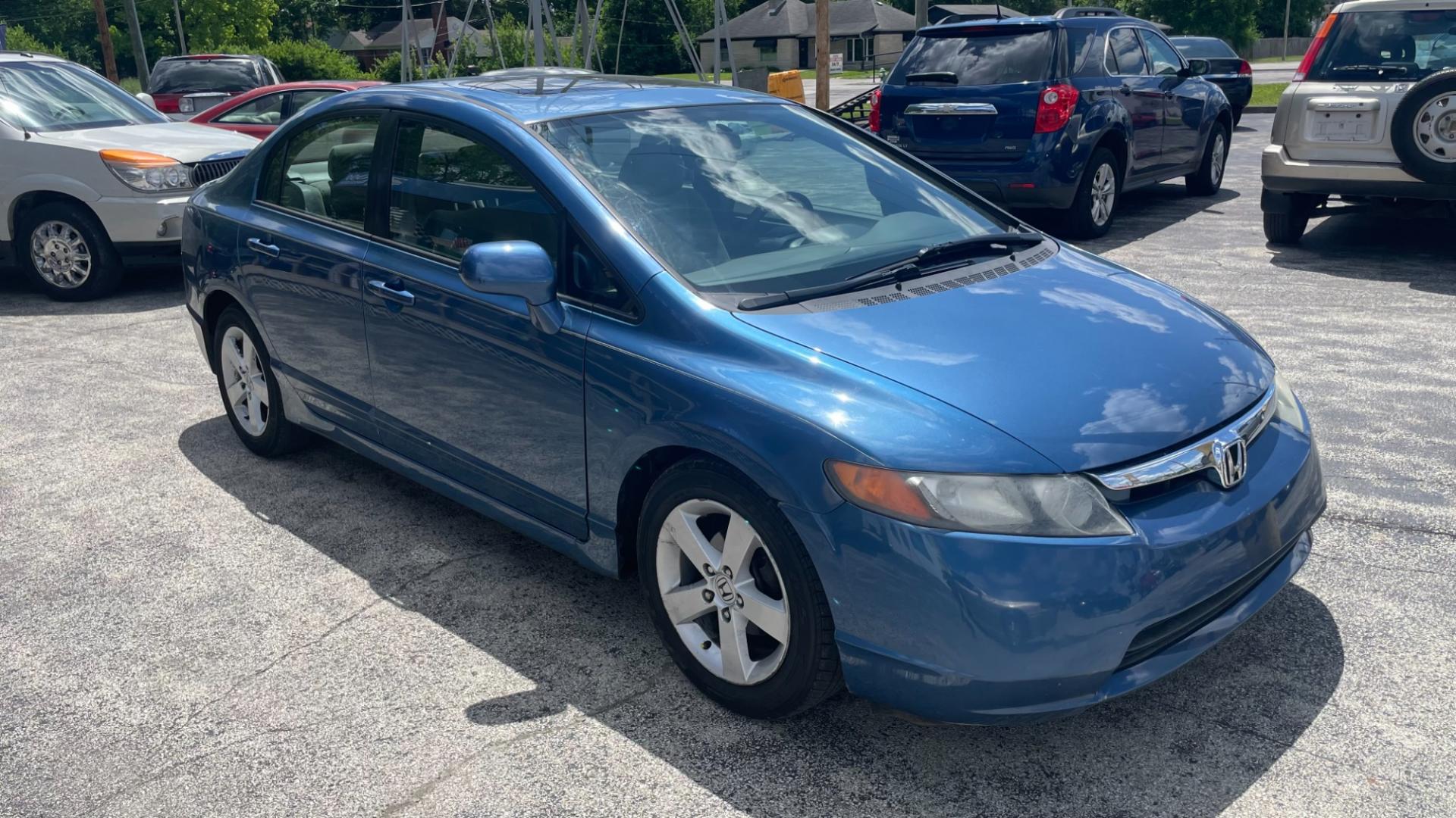 2006 BLUE Honda Civic EX Sedan (1HGFA158X6L) with an 1.8L L4 SOHC 16V engine, 5-Speed Manual transmission, located at 2710A Westlane Rd., Indianapolis, IN, 46268, (317) 291-2000, 39.885670, -86.208160 - Photo#0